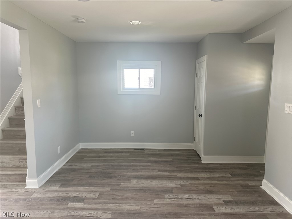 3550 Menlo Road Cleveland, OH 44120 - Photo 3 of 22 Spare room featuring dark hardwood / wood-style flooring