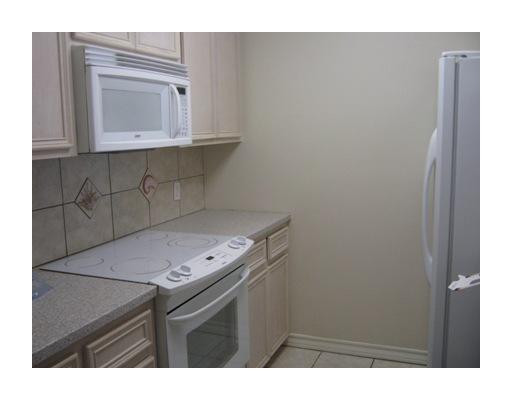 13969 Ports O Call Drive, Unit B Corpus Christi, TX 78418 - Photo 4 of 5 a utility room with dryer and washer