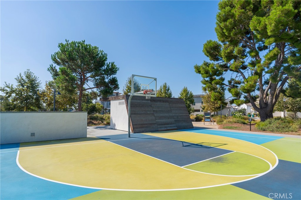 121 Baluster Irvine, CA 92618 - Photo 57 of 80 a view of a swimming pool with an outdoor space and seating area
