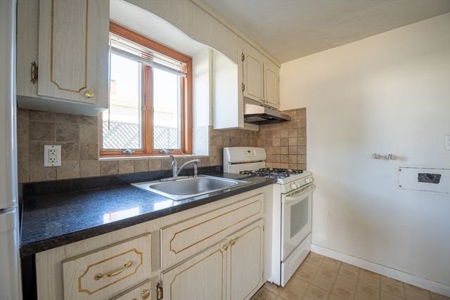 a view of a chairs with wooden fence