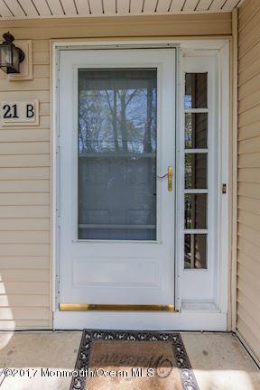 21 Maple Lane, Unit B Brielle, NJ 08730 - Photo 2 of 51 a view of a door of the house