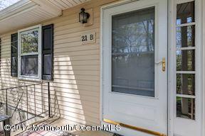21 Maple Lane, Unit B Brielle, NJ 08730 - Photo 3 of 51 a view of a door and a window
