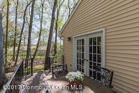 21 Maple Lane, Unit B Brielle, NJ 08730 - Photo 44 of 51 a view of a house with backyard and sitting area