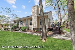 21 Maple Lane, Unit B Brielle, NJ 08730 - Photo 49 of 51 a view of a front of a house with a yard