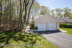 21 Maple Lane, Unit B Brielle, NJ 08730 - Photo 7 of 51 a view of a house with a yard and garage