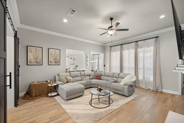 a kitchen that has a sink and a stove in it