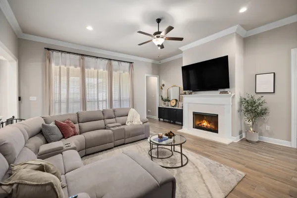 a kitchen with stainless steel appliances a stove a sink and cabinets
