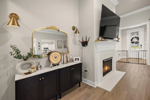 a bathroom with a double vanity sink a mirror and shower