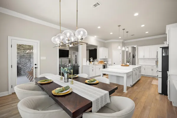 a room with gym equipment and windows