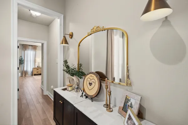 a view of a bathroom with wooden floor