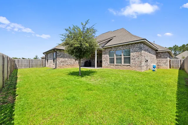 a view of a porch with a backyard