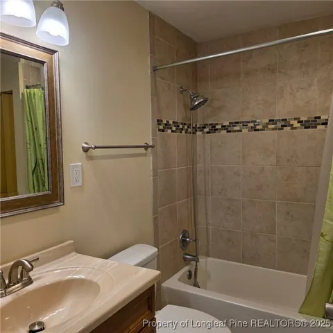 a bathroom with a sink and a bathtub
