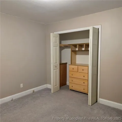 an empty room with closet