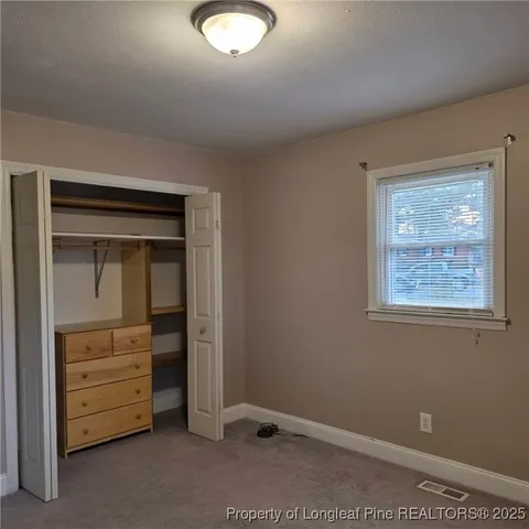 an empty room with closet