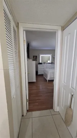 a bedroom with furniture and a fireplace