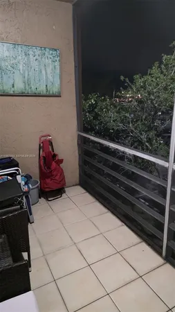 a view of a street with cars