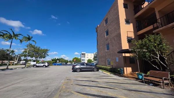 a car parked in front of a building