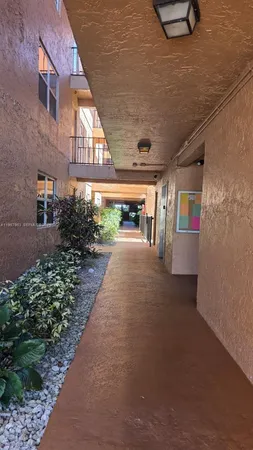 a view of a lake with a house in the background