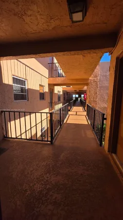 a view of a swimming pool with a garden