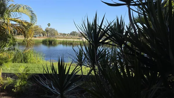 a view of a swimming pool with a chair