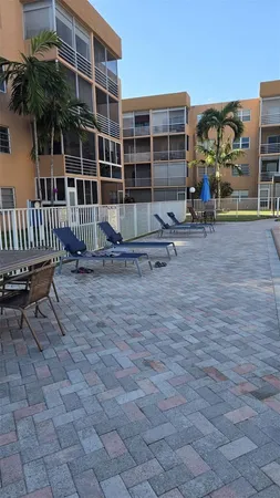 a view of a house with a swimming pool