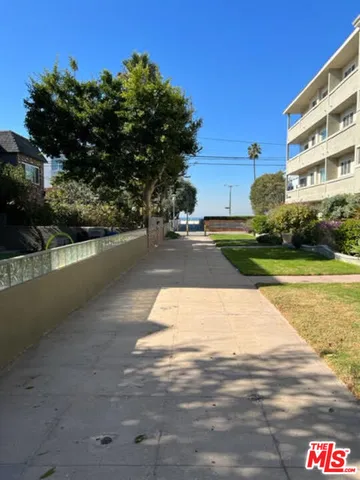 a view of building with yard