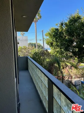 a view of empty room with a fireplace