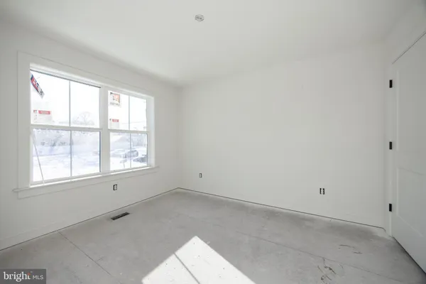 a view of a room with an empty space