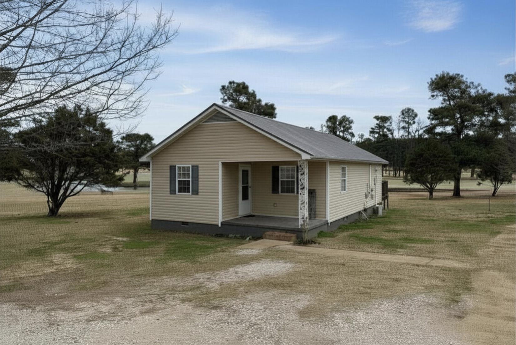 2030 South Main Street Covington, TN 38019 - Photo 1 of 27 a view of a house with a yard