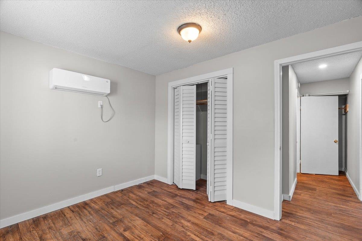 2030 South Main Street Covington, TN 38019 - Photo 15 of 27 wooden floor in an empty room with a window
