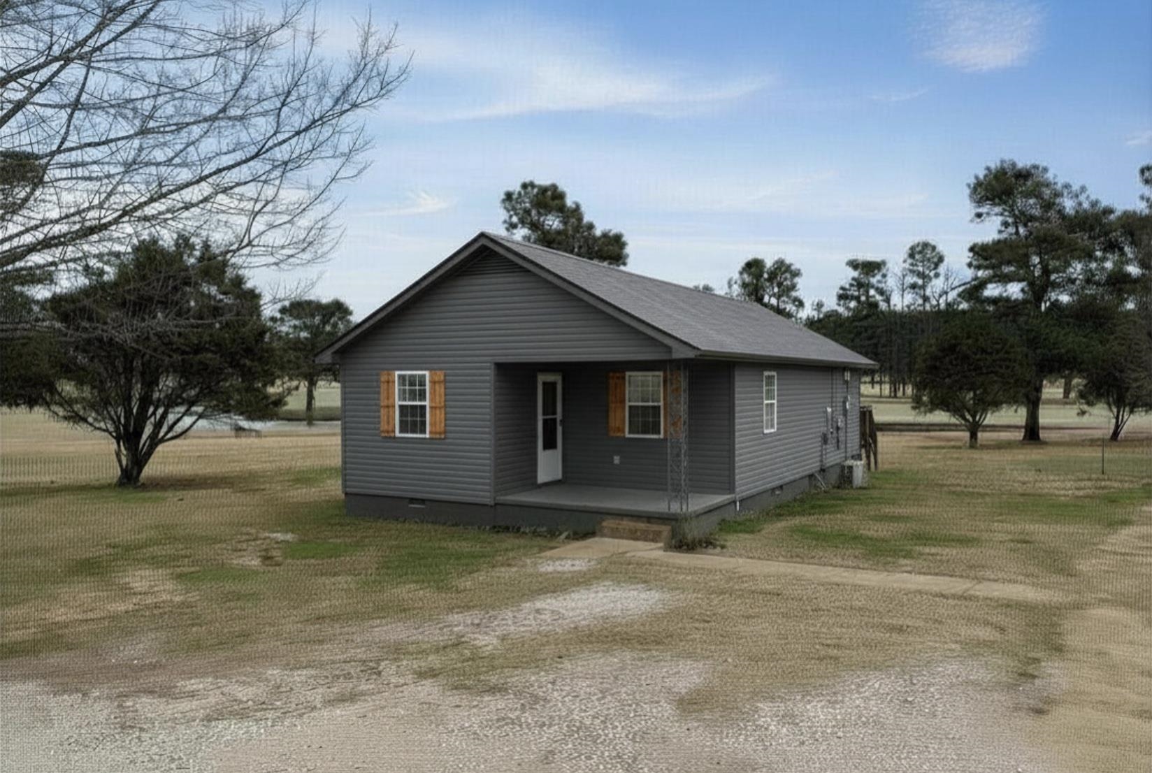2030 South Main Street Covington, TN 38019 - Photo 27 of 27 a view of a house with a yard