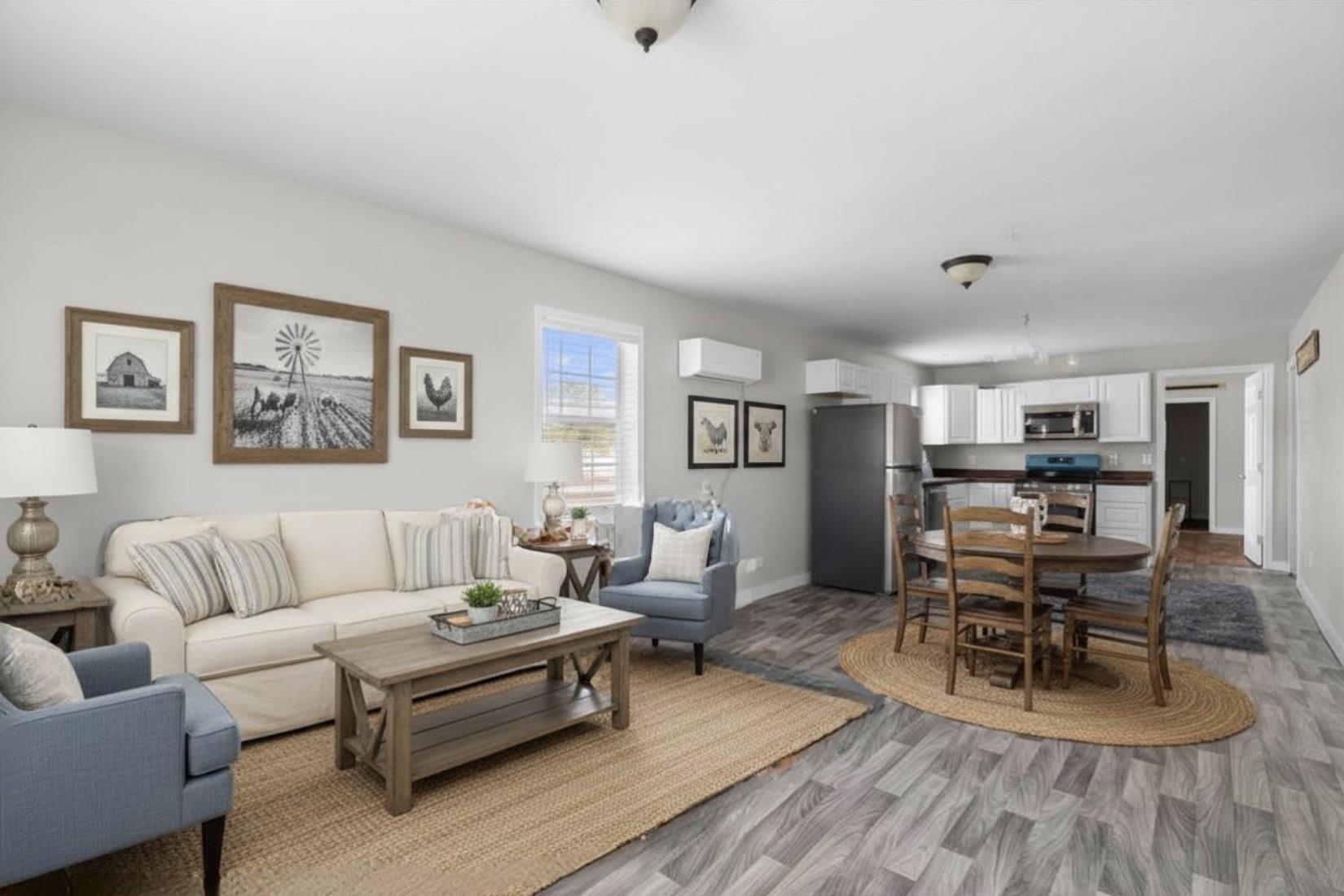 2030 South Main Street Covington, TN 38019 - Photo 4 of 27 a living room with furniture and a wooden floor