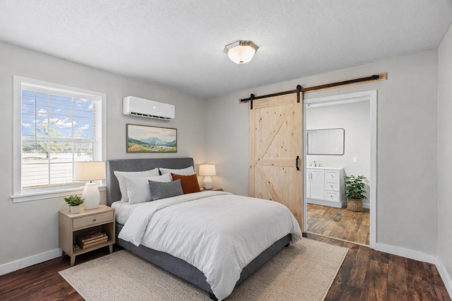 2030 South Main Street Covington, TN 38019 - Photo 9 of 27 a bedroom with a bed and a window