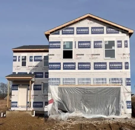 a large building with a small yard