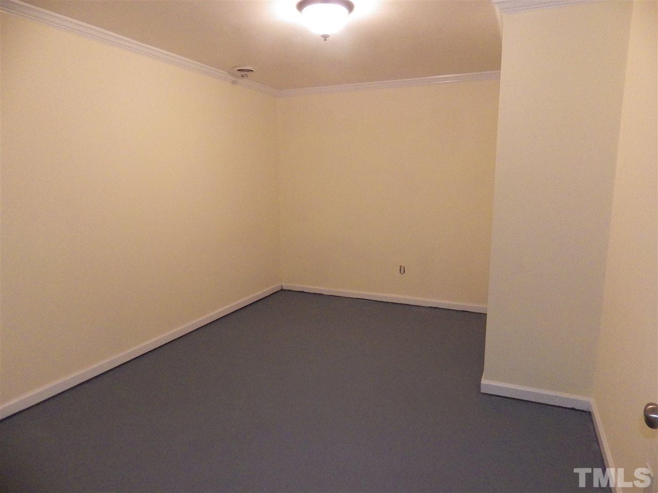 11212 Sedgefield Drive Raleigh, NC 27613 - Photo 13 of 16 Basement computer room, gaming room, movie room, exercise room or storage.
