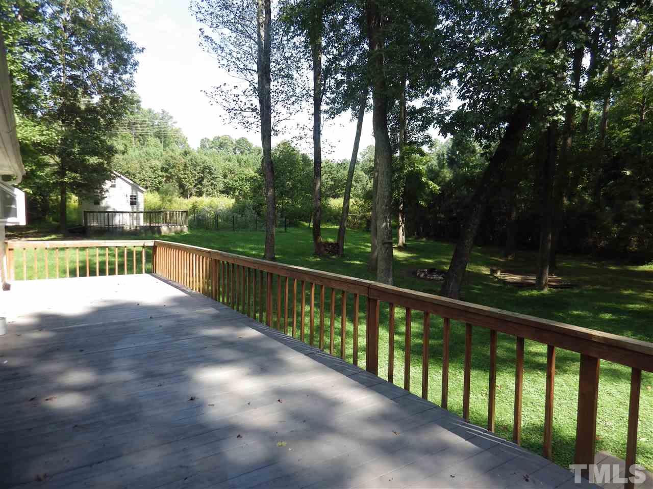 11212 Sedgefield Drive Raleigh, NC 27613 - Photo 15 of 16 Huge deck for entertaining or enjoying your large, private backyard.