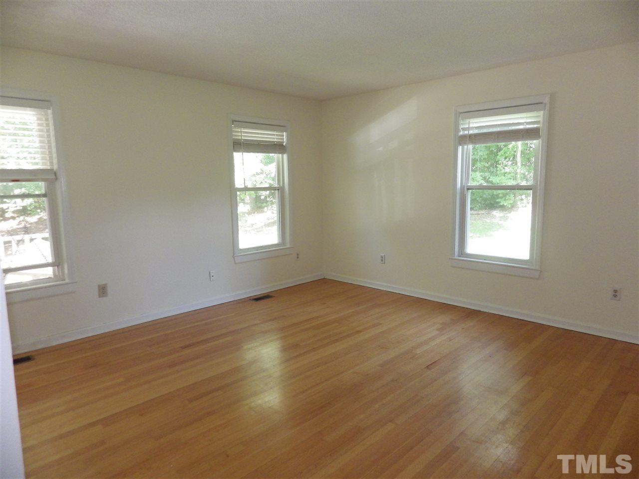 Large master bedroom located on first floor