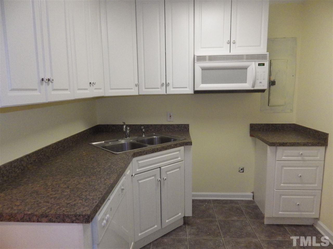 11212 Sedgefield Drive Raleigh, NC 27613 - Photo 10 of 16 Basement kitchen