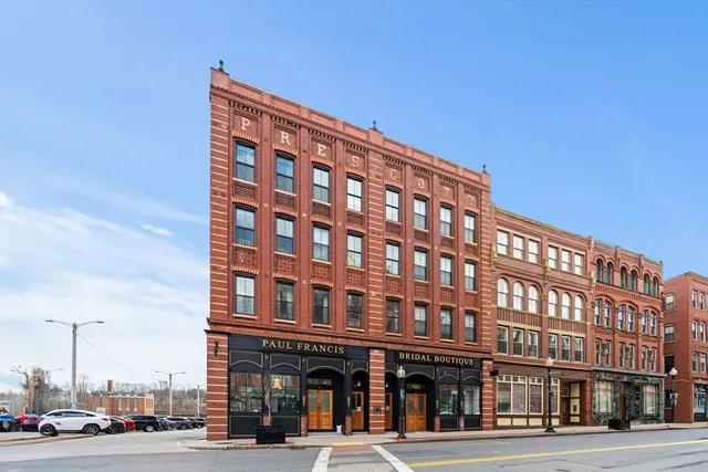 a front view of a building and a street