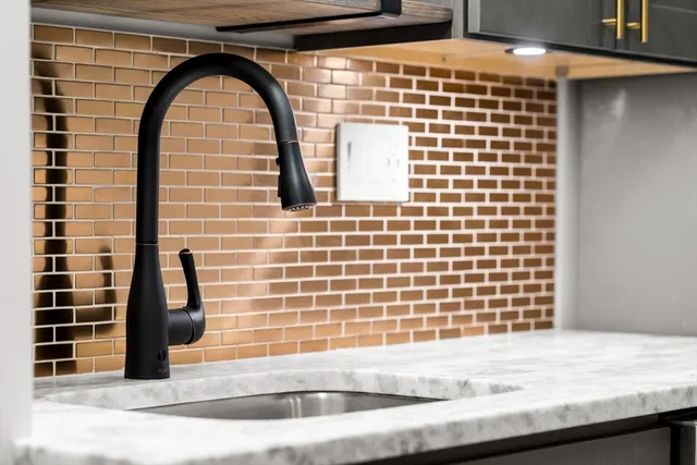 a view of wooden floor with a sink
