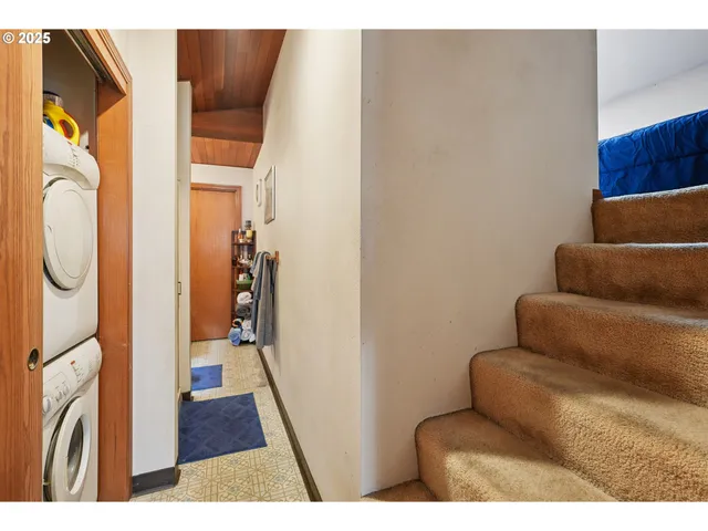 a bathroom with a sink a mirror and shower
