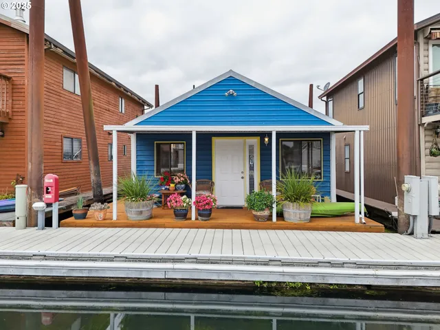 a front view of a house with porch and patio