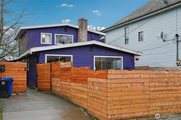 a front view of a house with a garage