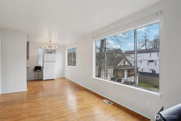 a view of an empty room with a window