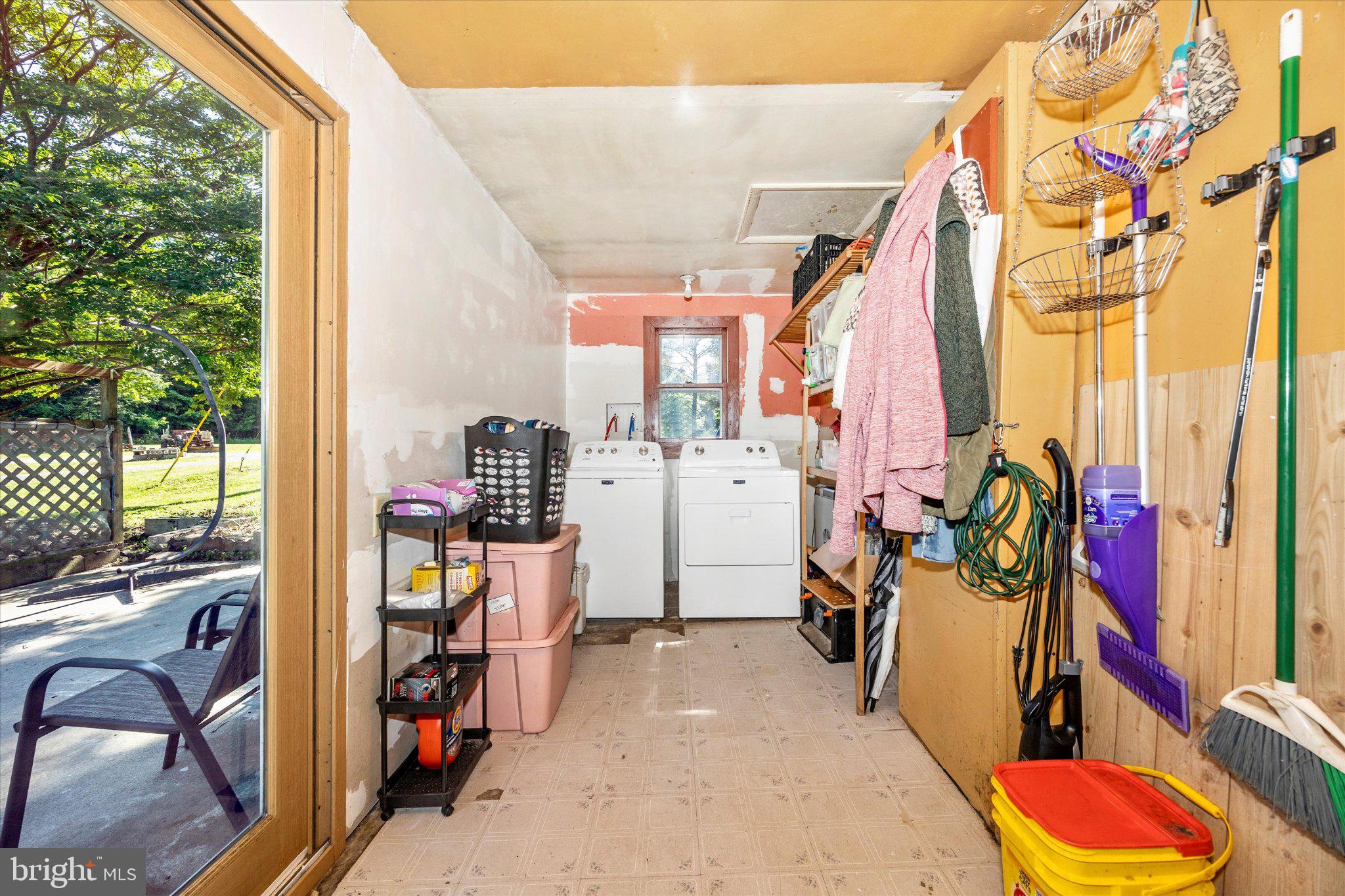 14721 Albert Staub Road Thurmont, MD 21788 - Photo 24 of 46 a view of walk in closet with clothes and shoes