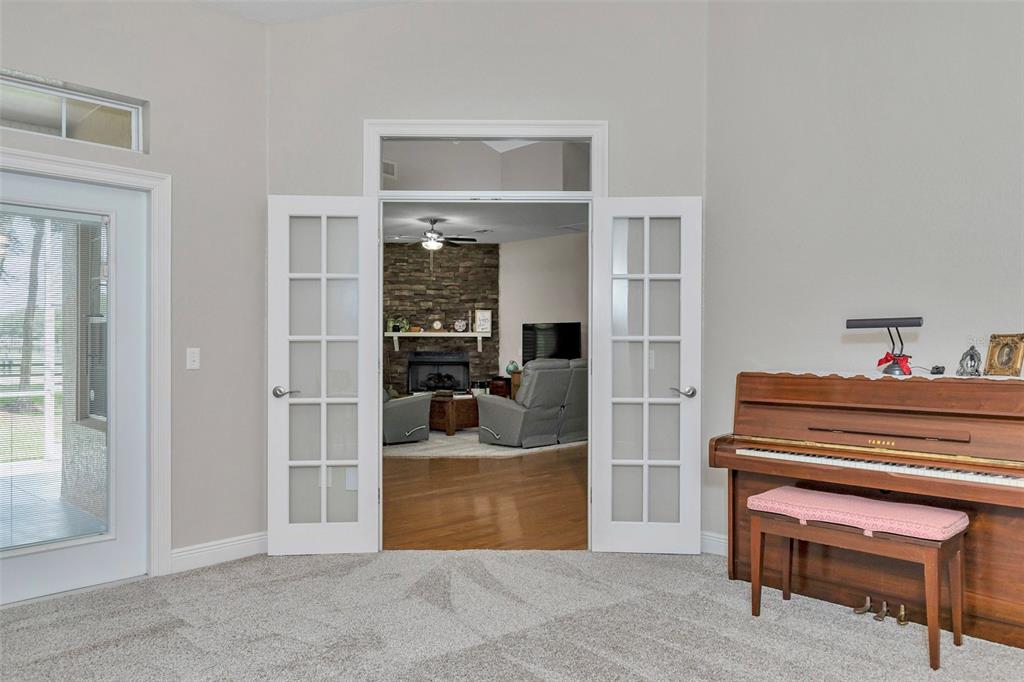 1989 Northwest 111th Loop Ocala, FL 34475 - Photo 12 of 55 a room with furniture and a window