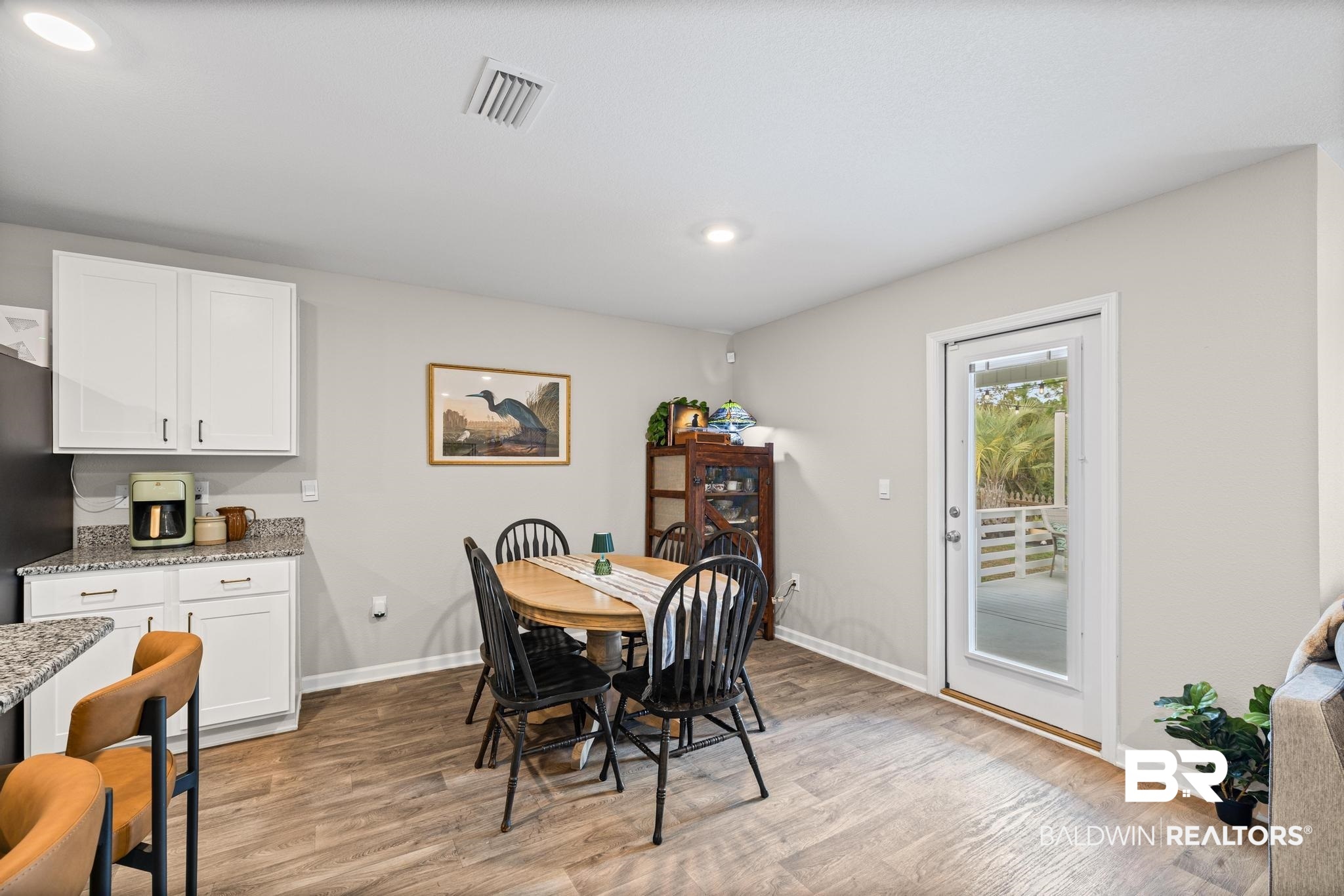3078 Camino Real Loop Lillian, AL 36549 - Photo 7 of 51 Dining area with light wood finished floors and recessed lighting