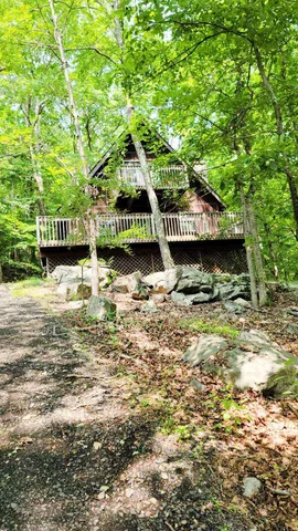 a view of a large body of water surrounded by trees