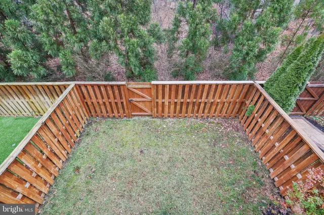a view of outdoor space with deck and yard