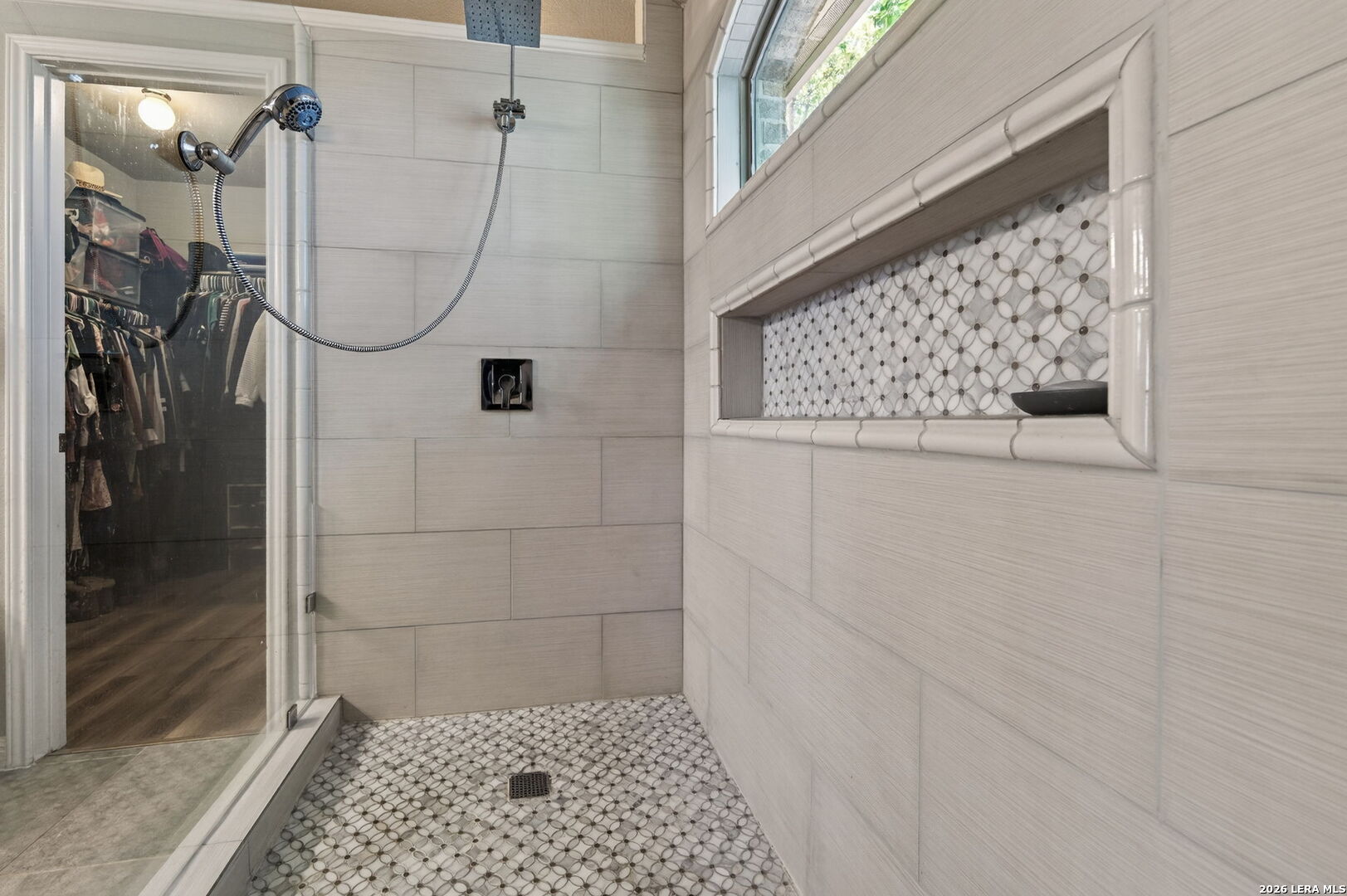 9514 Potters Point Helotes, TX 78023 - Photo 25 of 37 a bathroom with a shower